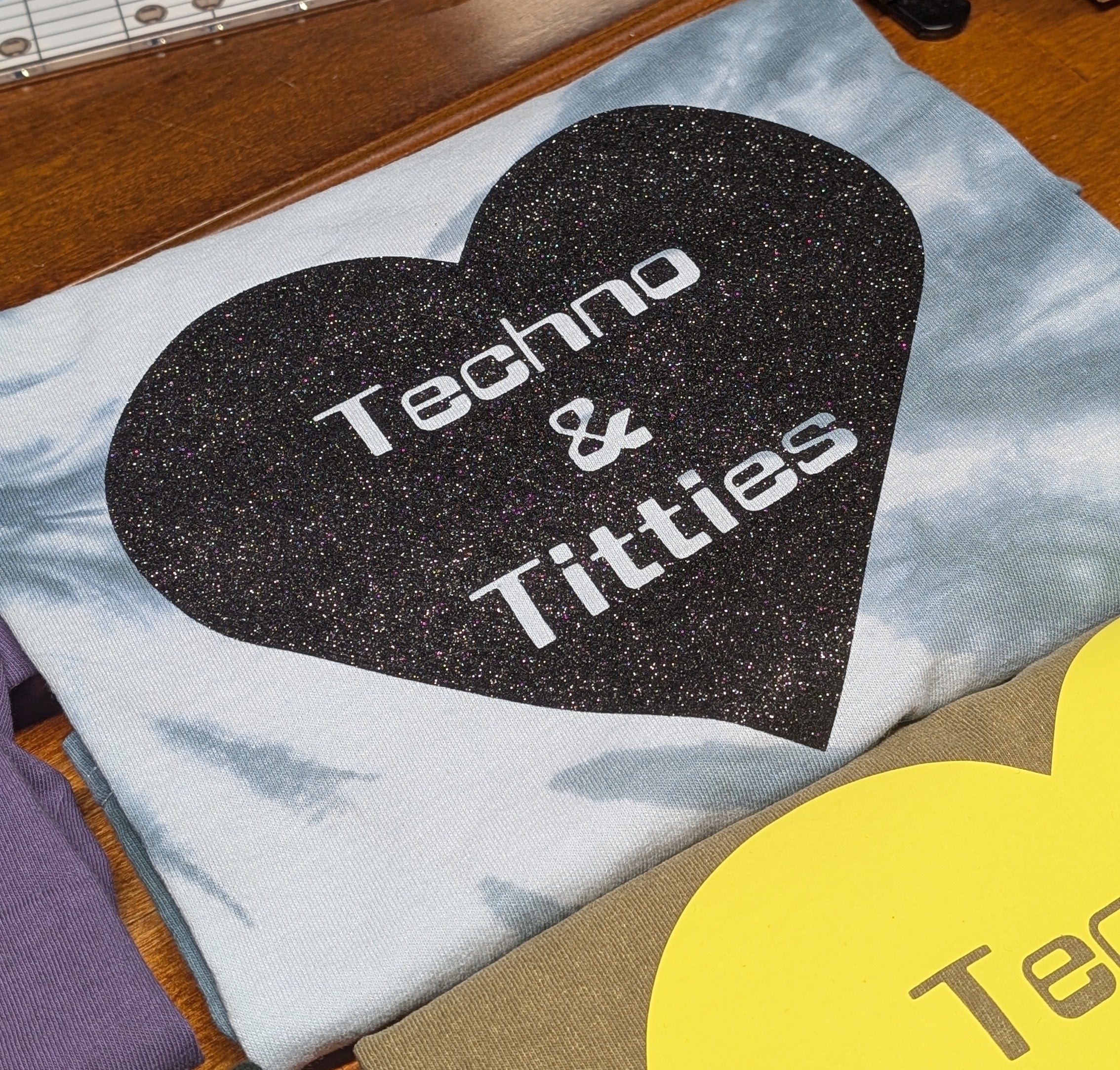 Techno & Titties T-shirt - teal tie-dye and glitter black